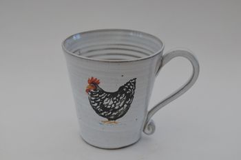 Mugg med svart höna