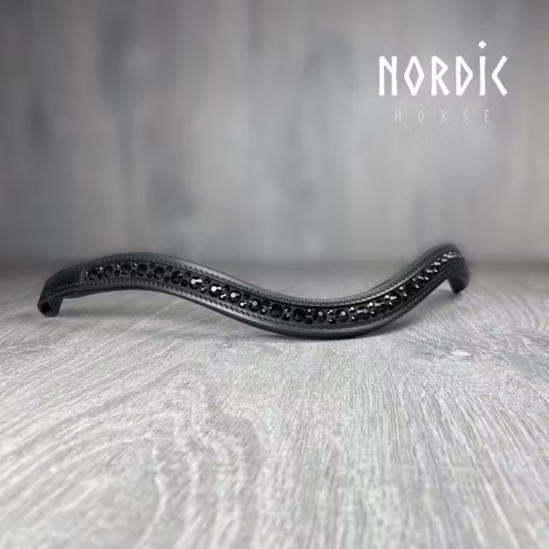 Pannband med svarta stenar