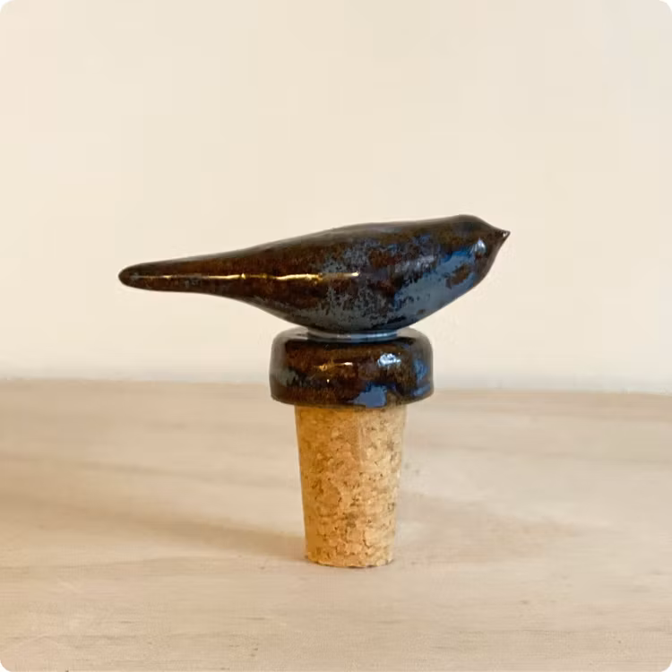 Flaskstoppare fågel blåbrun