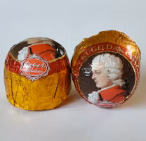 Reber - Mozartkugeln Dark Orange Pralinen/Mozartkula Apelsinpralin, 20g