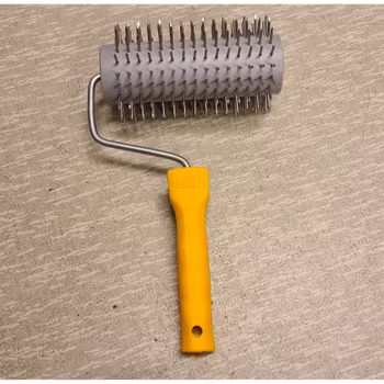 Avtäckningsrulle metalnålar