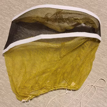 Slöja rund, gul och svart med rep