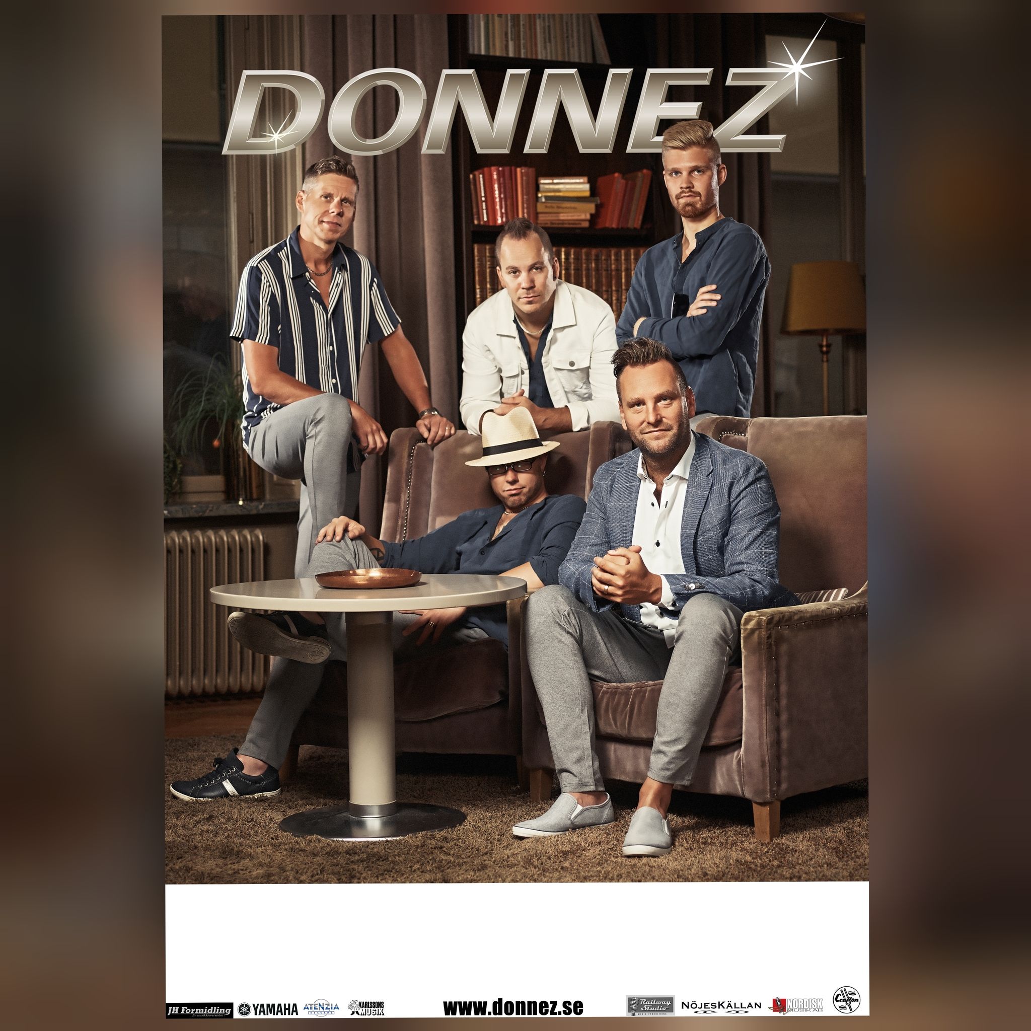 Signerad affisch med Donnez