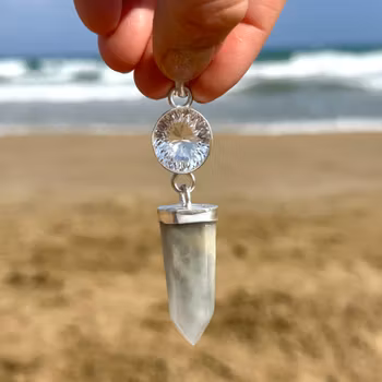 Maiden of the sea, clear quarts with blue/pink lithium.