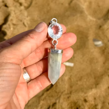 Maiden of the sea, clear quarts with blue/pink lithium.