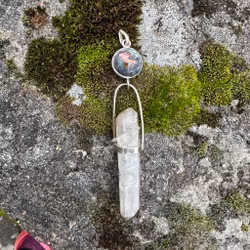 Galaxy opal ”draköga”  med dubbelterminerad lemurien kristall