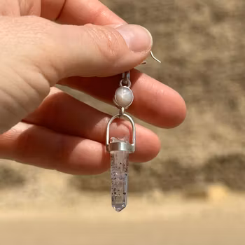 White sapphire with Brandenberg amethyst