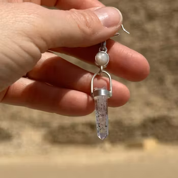 White sapphire with Brandenberg amethyst