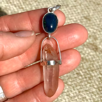 Black opal with double terminated pink Lemurian