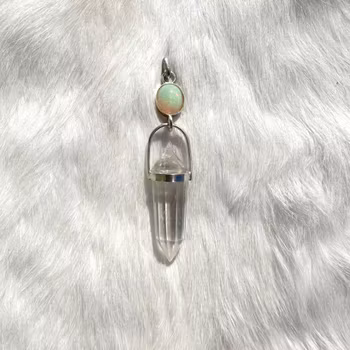 Opal with clear quartz Vogel crystal