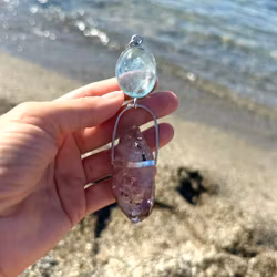 Big Aquarium with magical double terminated Brandenberg Amethyst