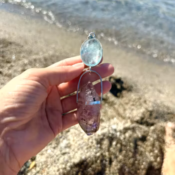 Big Aquarium with magical double terminated Brandenberg Amethyst