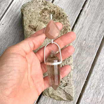 Masterpiece - Crystalline Frequency - Blossoming into You. Faceted natural moonstone with clear quartz Vogel crystal