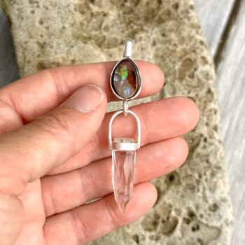 Fire agate with faceted clear quartz crystal