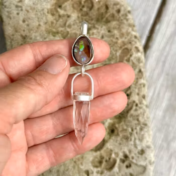 Fire agate with faceted clear quartz crystal