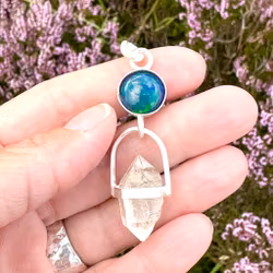 Dragons eye- black opal with double terminated clear quartz.