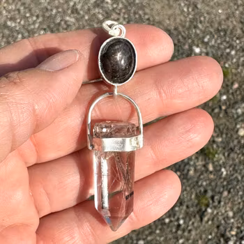 Star Diopside “Black Star” with silver Rutilated Quartz.