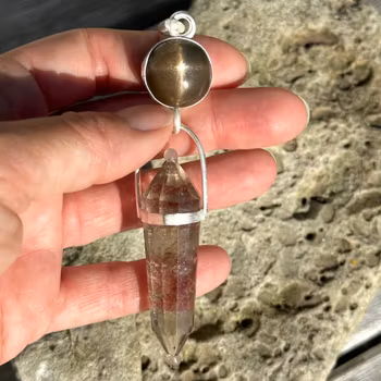 Raa- bringer of the light. Star sunstone with Smokey citrine Vogel.   Masterpiece