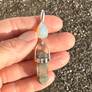 Velo Opal with double terminated Lodolite from Norway.