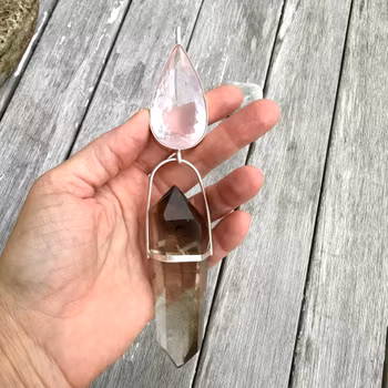 Cosmic love, embodying the Dragon energy and love through the field. Rose quartz with double terminated Lodolite