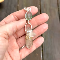 Mary Magdalene and Christ consciousness in holy balance.  Green and pink tourmaline with very special clear quartz crystal