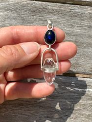Dragon egg of the Cosmic Womb and the oceans of abundant magic- Black opal with clear Quartz Dragon egg.