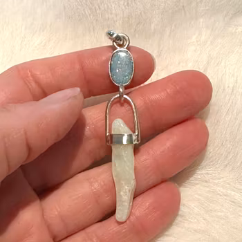 Isis and the white healing flame of truth-White opal from Australia with white Boulder Opal from Australia.