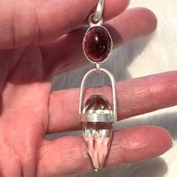 The dragon of the feminine warrior of love and feminine flow- Deep pink Tourmaline with light Smokey Quartz Dragon egg.
