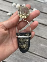 New Golden age- Citrine with Phyrite crystals of black stone