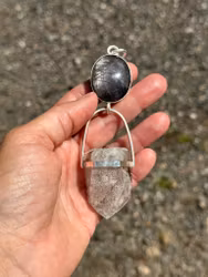 Star lovers- Double star Sapphire with white Lodolite Quartz Crystal   This is an amazing piece with two very special crystals.  I see two celestial bodies moving together, longing to reach each other