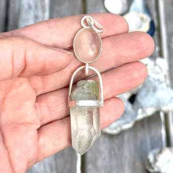 Natural moonstone (with cat eye effect) with light Lodolite
