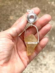 The golden orb- clear quartz with Libyen Tectite