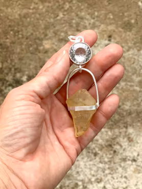 The golden orb light portal- clear quartz with Libyen Tectite