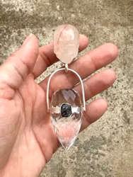 Adamantia- infusing the feminine reawakening with power  Fire Quartz with clear Quartz dragon egg with black diamond.