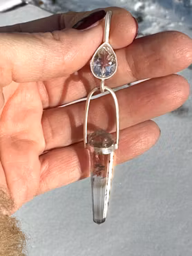 The Fire Horse Light Portal- A Living Threshold of Celestial Illumination. clear quartz light portal with fire horse Vogel crystal.