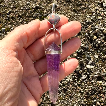 Black opal with Amethyst Vogel crystal