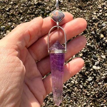 Black opal with Amethyst Vogel crystal