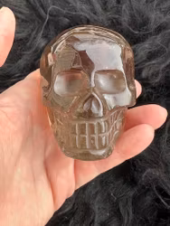 Smokey rutilated quartz skull
