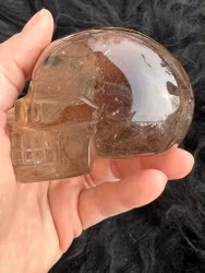 Smokey rutilated quartz skull
