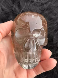 Smokey rutilated quartz skull