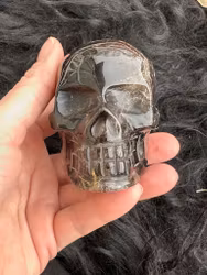 Dark smokey ritilated quartz skull
