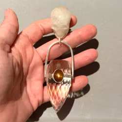 Skull of Freja- Quartz with high-frequency Dragon Egg and Natural Sunstone from Sweden