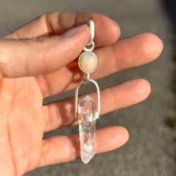 The Celestial Isis - white opal with naturally double terminated clear quartz from Yunnan.