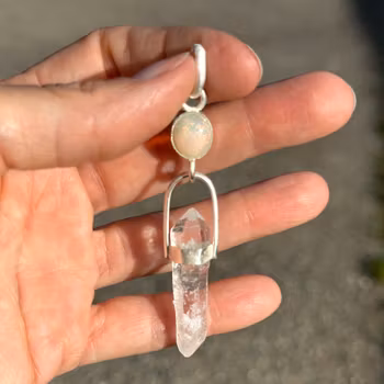 The Celestial Isis - white opal with naturally double terminated clear quartz from Yunnan.