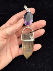 The Return of the Star Sisters  Amethyst with Lodolite