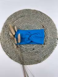 Snurrepannebånd turkis str 50-54