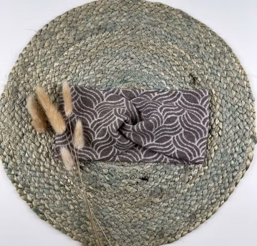 Snurrepannebånd beige Letti