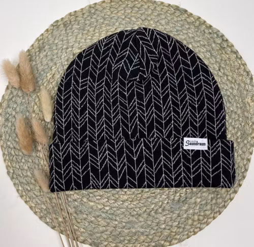 Brettopphue svart Pil str L