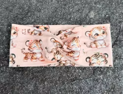 Snurrepannebånd str 52/54 (ca 3-9 år)