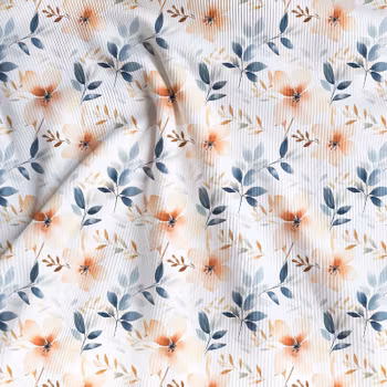 Ribbad Jersey med orange blommor.
